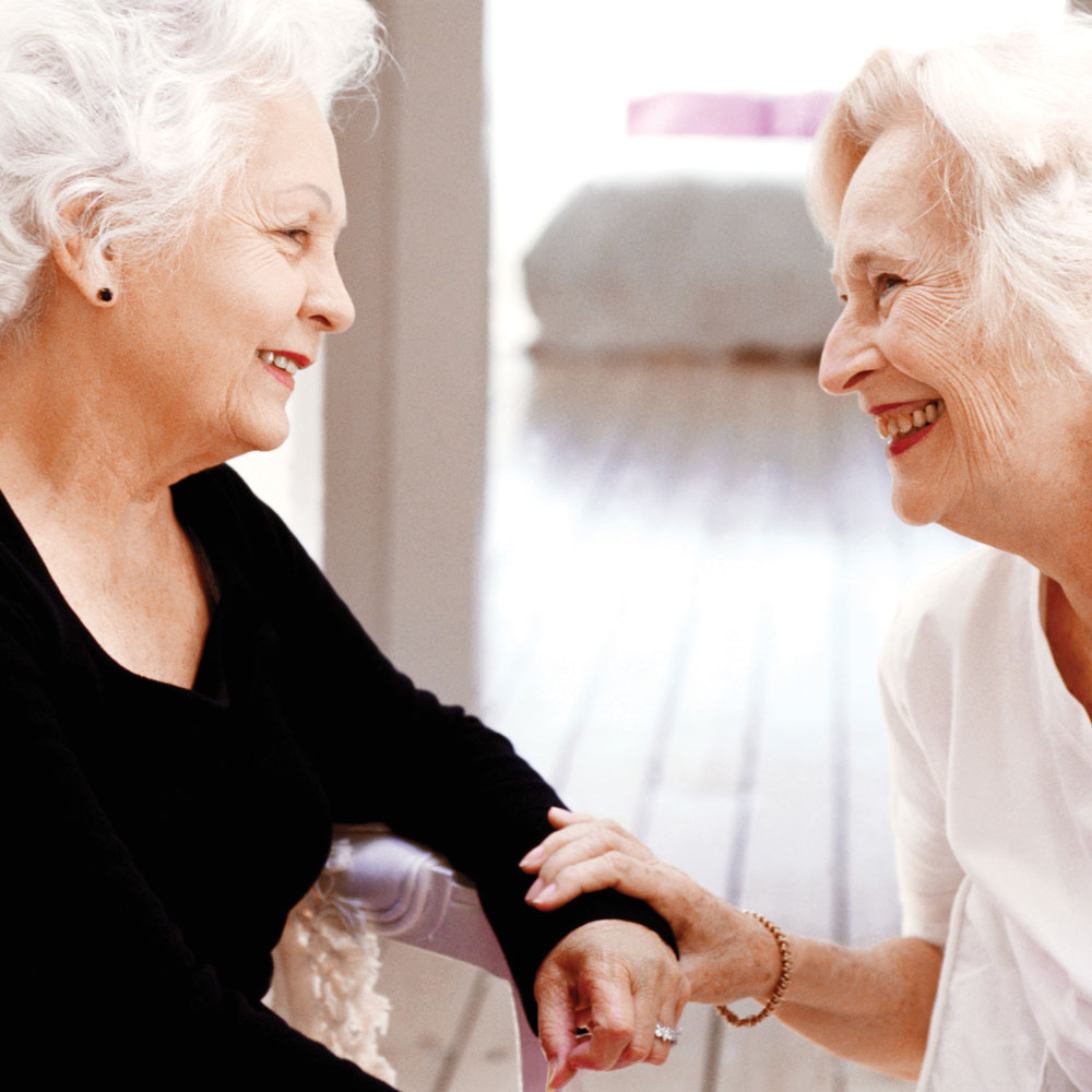 two senior women meeting each other for the first time