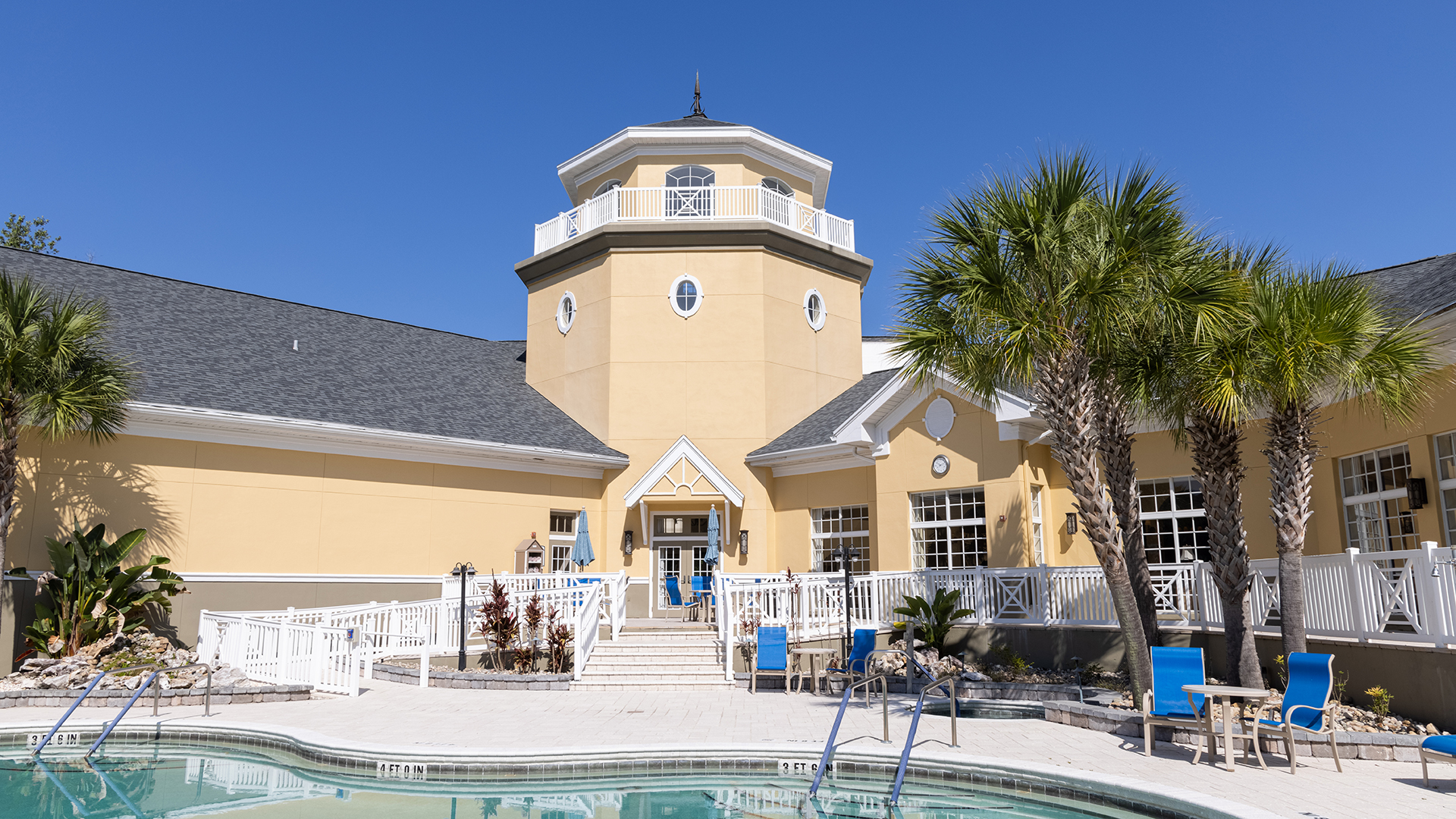 Santa Fe The Village at Gainesville Senior Living Community outdoor pool and club house